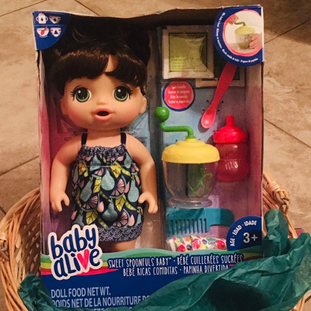 Baby Alive Doll with accessories, excludes the basket